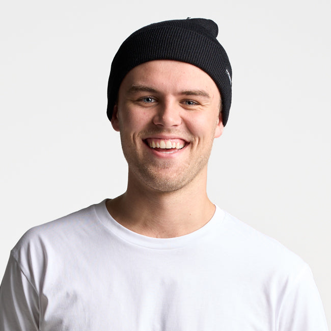 1501P POM POM BEANIE by FLEXFIT® | BLACK